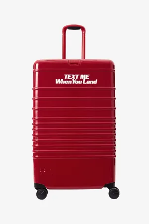 Resale The Large Check-In Roller in Text Me Red