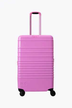The Medium Check-In Roller in Glossy Berry