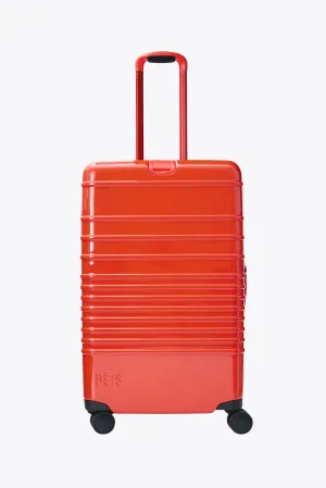 The Medium Check-In Roller in Glossy Flame